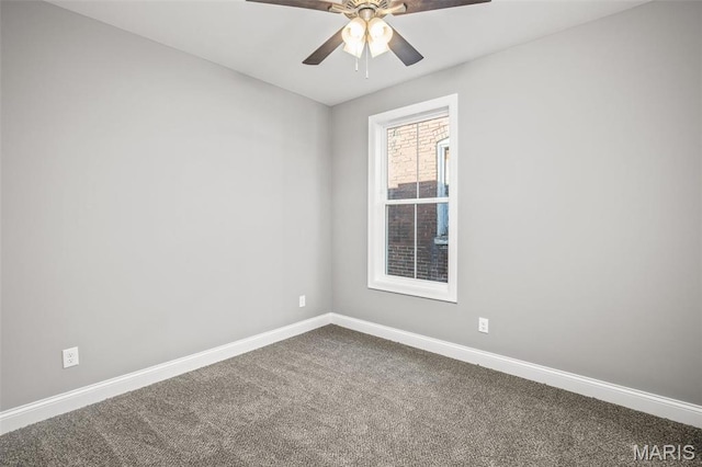 3400 Vista Ave, Saint Louis, MO 63104 - empty room featuring a ceiling fan and dark carpet
