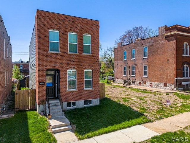 3400 Vista Ave, Saint Louis, MO 63104 - view of front of property featuring brick siding and a front yard
