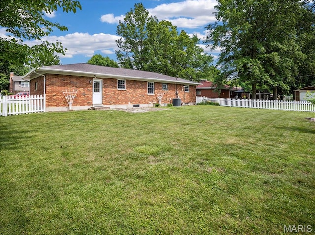 9 Richard St, Waterloo, IL 62298 - back of house with brick siding, a fenced backyard, and entry steps