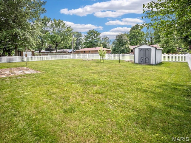 9 Richard St, Waterloo, IL 62298 - fenced backyard with a storage unit