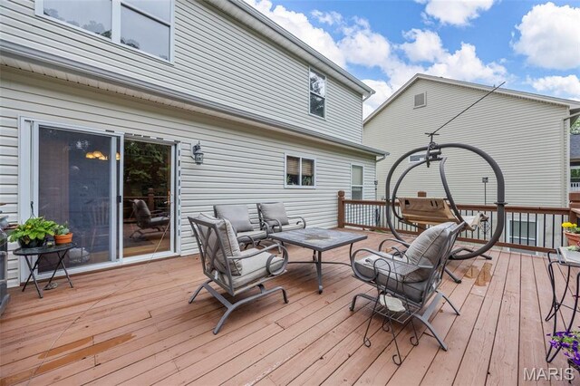 24 Milton Brennan Manor Ct, Wentzville, MO 63385 - wooden terrace with an outdoor hangout area