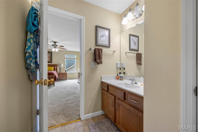 24 Milton Brennan Manor Ct, Wentzville, MO 63385 - bathroom featuring vanity, a ceiling fan, and tile patterned floors