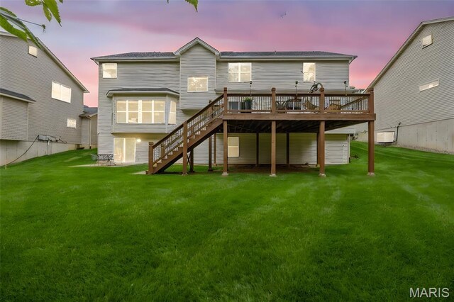 24 Milton Brennan Manor Ct, Wentzville, MO 63385 - rear view of property with a wooden deck, stairway, and a yard
