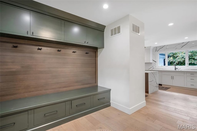 1607 Wyncliff Ln, Frontenac, MO 63131 - mudroom with light wood finished floors and recessed lighting