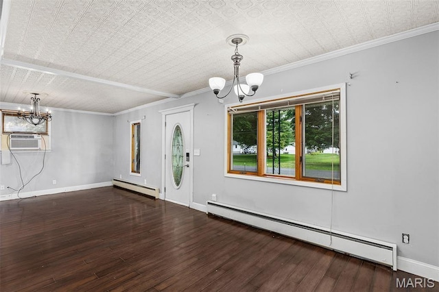 912 N Illinois Ave, Litchfield, IL 62056 - entrance foyer featuring a chandelier, a baseboard radiator, a baseboard heating unit, wood-type flooring, and an ornate ceiling