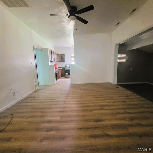 945 Cedar St, Poplar Bluff, MO 63901 - unfurnished living room with ceiling fan and wood finished floors