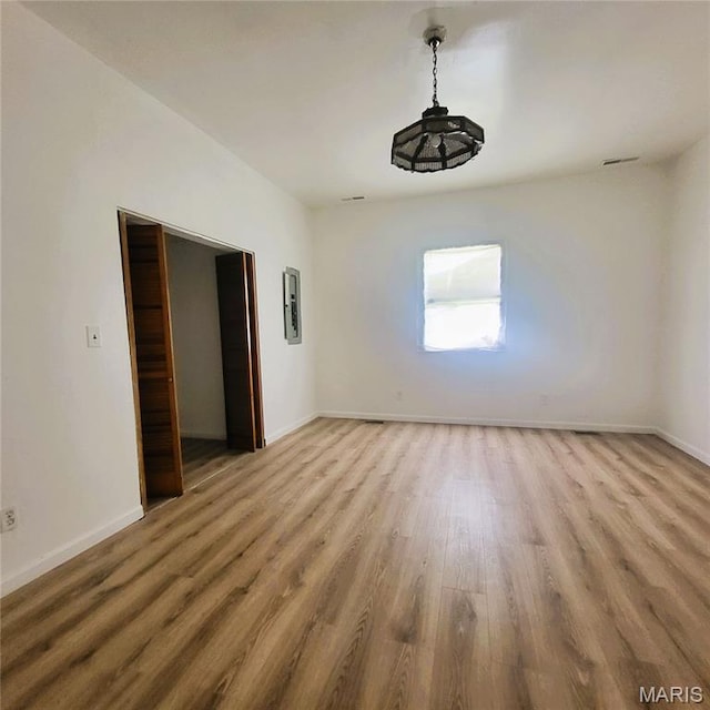 945 Cedar St, Poplar Bluff, MO 63901 - unfurnished room featuring wood finished floors and baseboards