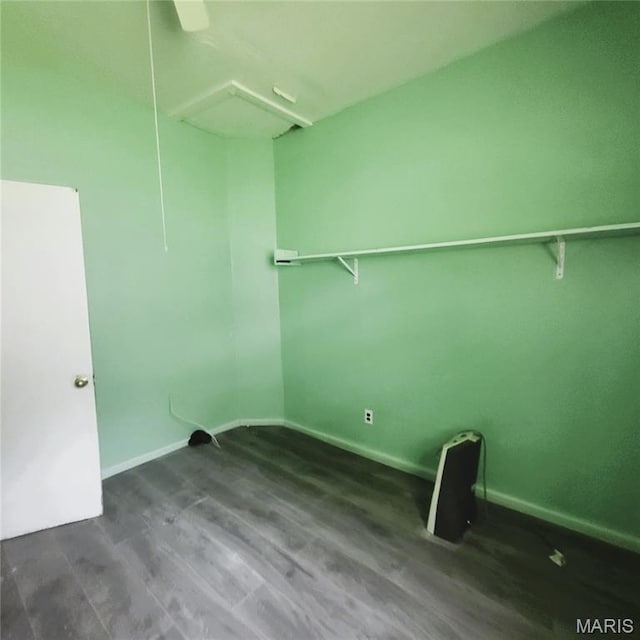 945 Cedar St, Poplar Bluff, MO 63901 - laundry area with wood finished floors and baseboards