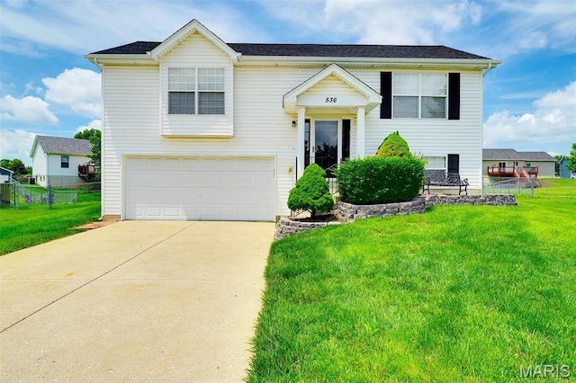 536 White Fence Dr, Wentzville, MO 63385 - raised ranch with a garage and concrete driveway