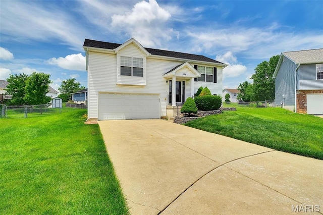 536 White Fence Dr, Wentzville, MO 63385 - bi-level home featuring an attached garage and concrete driveway