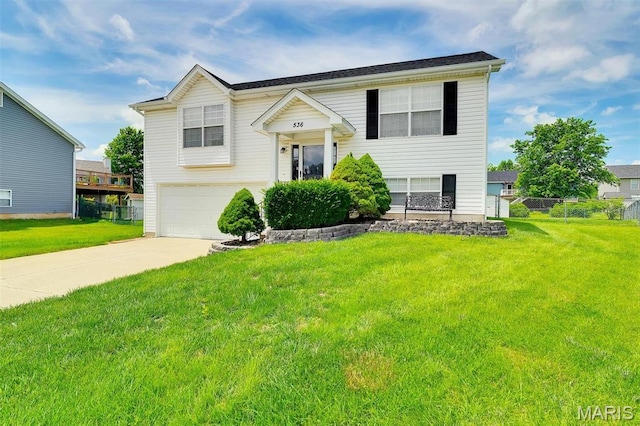 536 White Fence Dr, Wentzville, MO 63385 - raised ranch with driveway and a garage