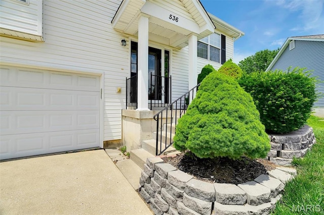 536 White Fence Dr, Wentzville, MO 63385 - property entrance featuring an attached garage