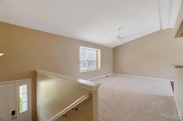 536 White Fence Dr, Wentzville, MO 63385 - empty room with vaulted ceiling, ceiling fan, and light colored carpet