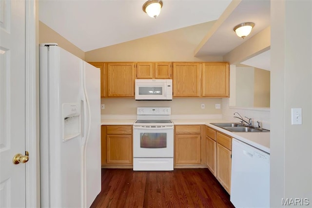 536 White Fence Dr, Wentzville, MO 63385 - kitchen featuring white appliances, light brown cabinetry, light countertops, dark wood-type flooring, and lofted ceiling