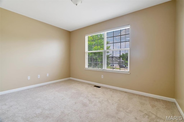 536 White Fence Dr, Wentzville, MO 63385 - carpeted spare room with baseboards