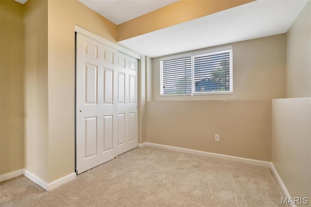 536 White Fence Dr, Wentzville, MO 63385 - unfurnished bedroom featuring light colored carpet and a closet