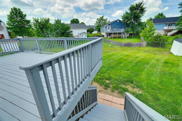 536 White Fence Dr, Wentzville, MO 63385 - wooden deck featuring a shed, a fenced backyard, and a residential view