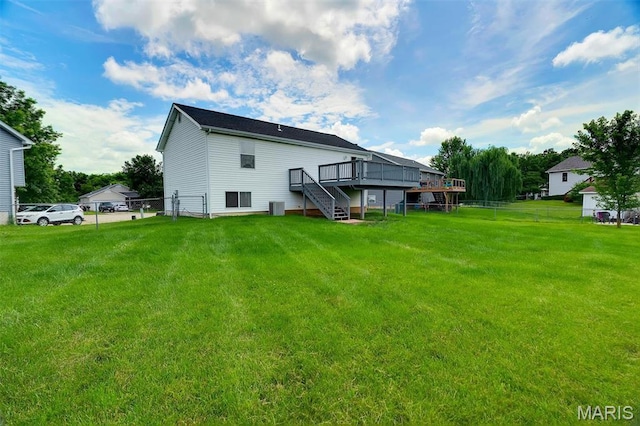 536 White Fence Dr, Wentzville, MO 63385 - rear view of property with stairway and a deck