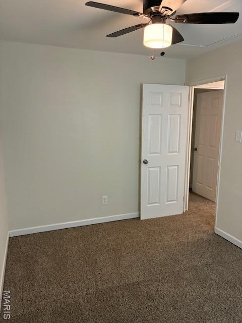 515 N 37th St, Belleville, IL 62226 - unfurnished bedroom featuring carpet and ceiling fan