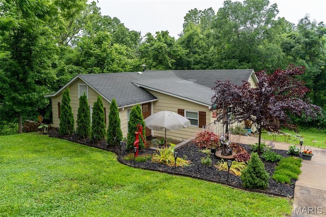 623 Boyne St, De Soto, MO 63020 - view of property exterior with a lawn and roof with shingles