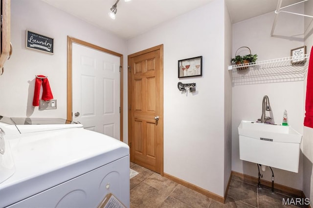 595 Chancellor Dr, Edwardsville, IL 62025 - washroom with separate washer and dryer and light tile patterned flooring