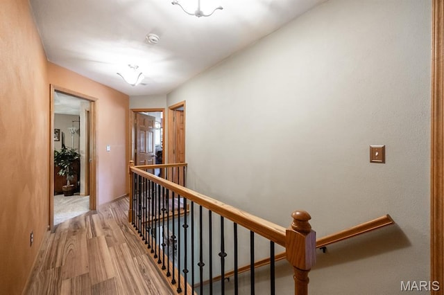 595 Chancellor Dr, Edwardsville, IL 62025 - corridor featuring an upstairs landing and light wood finished floors