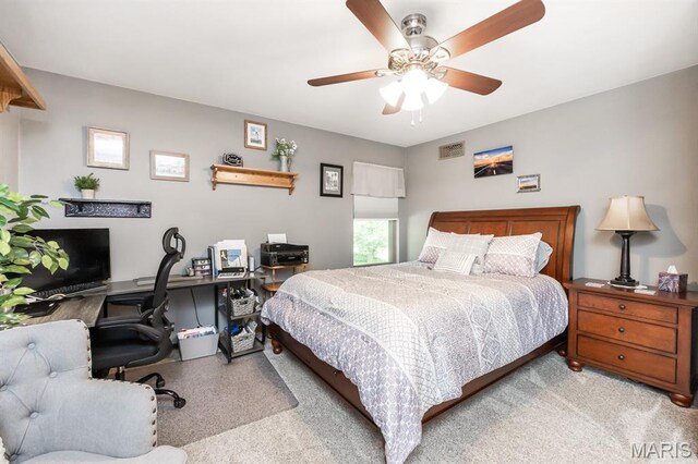 595 Chancellor Dr, Edwardsville, IL 62025 - carpeted bedroom featuring a desk and ceiling fan