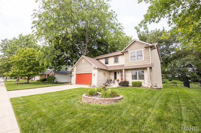 595 Chancellor Dr, Edwardsville, IL 62025 - traditional-style home featuring driveway, a garage, a front lawn, and stone siding