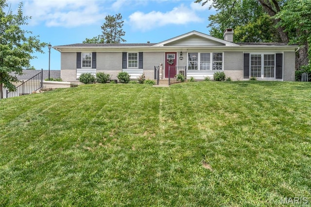 4004 W Dr, Saint Peters, MO 63376 - single story home featuring a chimney, brick siding, and a front yard