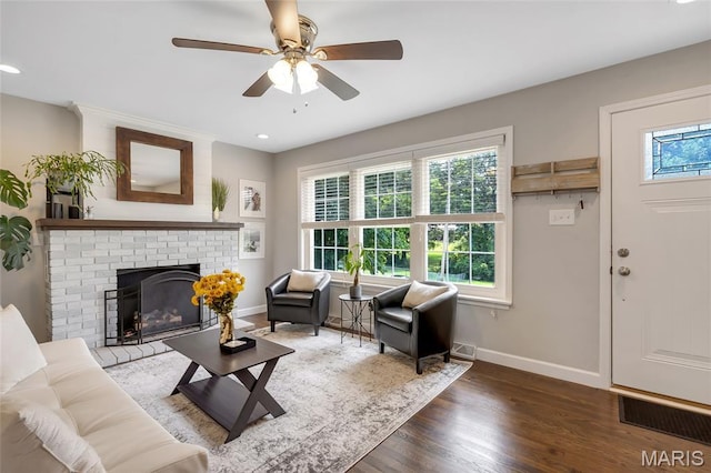 4004 W Dr, Saint Peters, MO 63376 - living area featuring wood finished floors, a ceiling fan, a brick fireplace, and recessed lighting