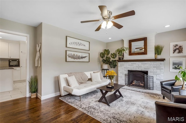 4004 W Dr, Saint Peters, MO 63376 - living area featuring ceiling fan, a brick fireplace, recessed lighting, and light wood-type flooring