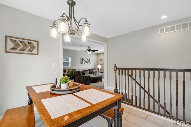 4004 W Dr, Saint Peters, MO 63376 - dining area featuring a chandelier, a ceiling fan, light tile patterned floors, and recessed lighting