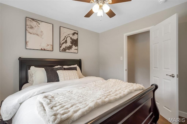 4004 W Dr, Saint Peters, MO 63376 - bedroom featuring ceiling fan and dark wood finished floors