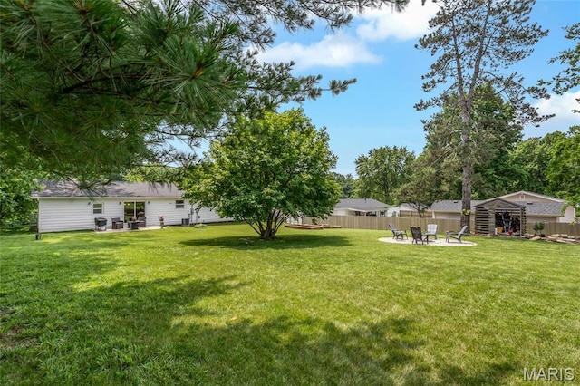 4004 W Dr, Saint Peters, MO 63376 - view of yard featuring a patio area and an outdoor fire pit