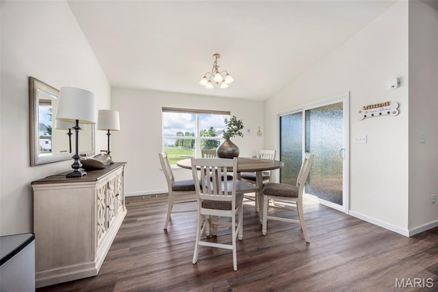 155 Pampano Ln, Saint Charles, MO 63301 - dining space featuring vaulted ceiling, a chandelier, and dark wood-style flooring