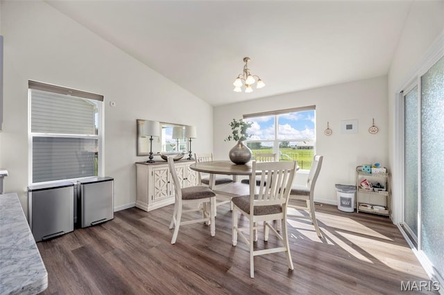 155 Pampano Ln, Saint Charles, MO 63301 - dining area with dark wood-style flooring, a chandelier, and vaulted ceiling