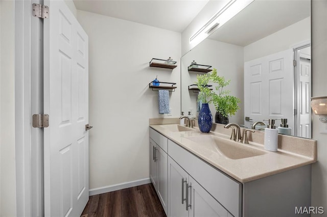 155 Pampano Ln, Saint Charles, MO 63301 - bathroom featuring double vanity and wood finished floors