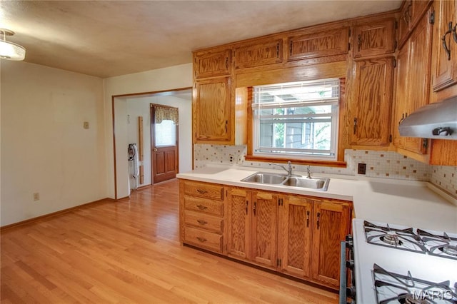 6155 Raymond Rd, Bunker Hill, IL 62014 - kitchen featuring tasteful backsplash, plenty of natural light, and light countertops