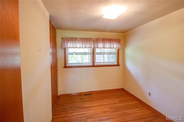 6155 Raymond Rd, Bunker Hill, IL 62014 - empty room featuring light wood finished floors and baseboards
