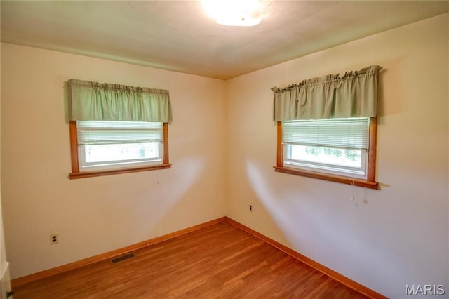 6155 Raymond Rd, Bunker Hill, IL 62014 - spare room featuring wood finished floors