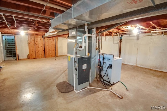 6155 Raymond Rd, Bunker Hill, IL 62014 - unfinished basement with washer / dryer and heating unit