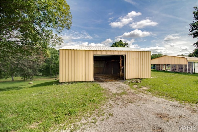 6155 Raymond Rd, Bunker Hill, IL 62014 - view of pole building with a yard