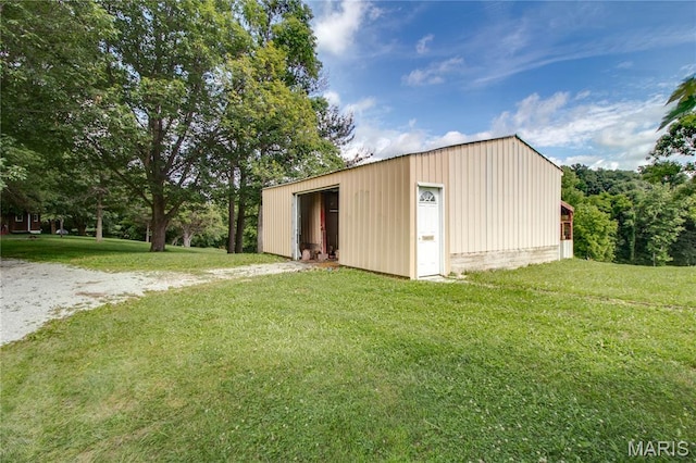 6155 Raymond Rd, Bunker Hill, IL 62014 - view of pole building featuring a yard