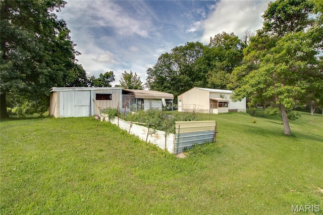 6155 Raymond Rd, Bunker Hill, IL 62014 - view of yard with an outbuilding and an outdoor structure