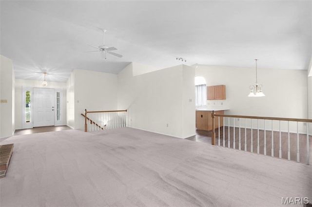 527 Wetherby Terrace Dr, Ballwin, MO 63021 - empty room with vaulted ceiling, ceiling fan, and carpet floors