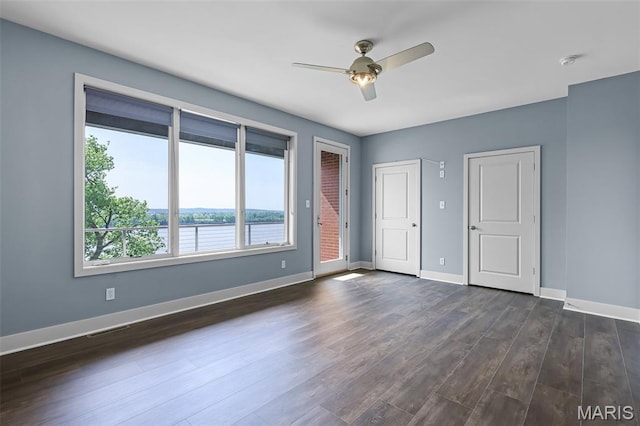 5310 Chouteaus Bluff Dr Unit 5310, Saint Louis, MO 63111 - unfurnished bedroom featuring dark wood-type flooring and a ceiling fan