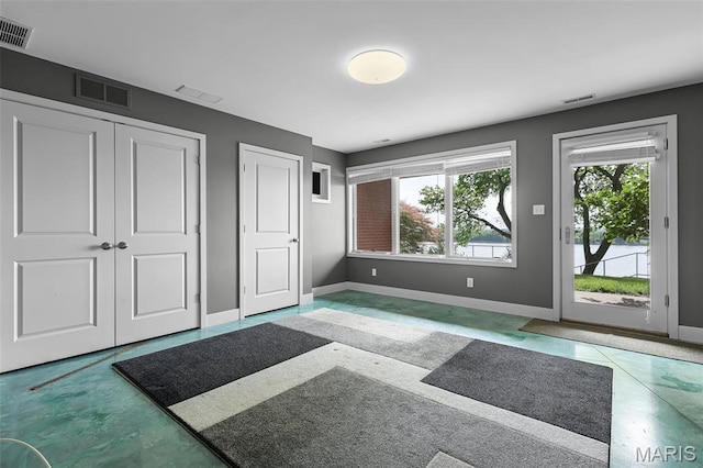 5310 Chouteaus Bluff Dr Unit 5310, Saint Louis, MO 63111 - unfurnished bedroom featuring access to exterior and a closet