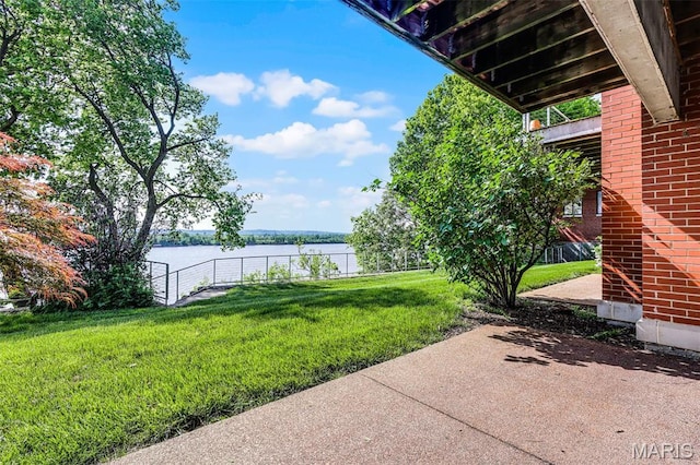 5310 Chouteaus Bluff Dr Unit 5310, Saint Louis, MO 63111 - view of yard featuring a water view and a patio