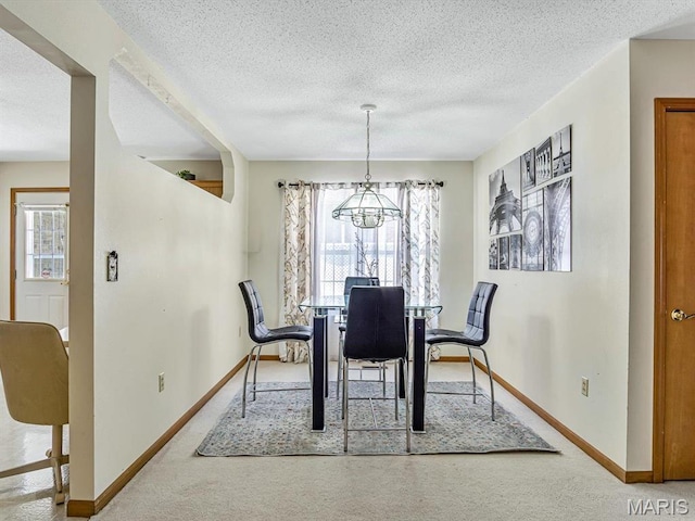 344 Westline Ct, Shiloh, IL 62221 - carpeted dining space with a chandelier, a textured ceiling, and healthy amount of natural light