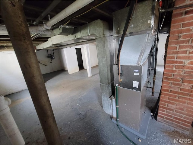 2965 Kincaid Ave, St John, MO 63114 - unfinished basement with heating unit